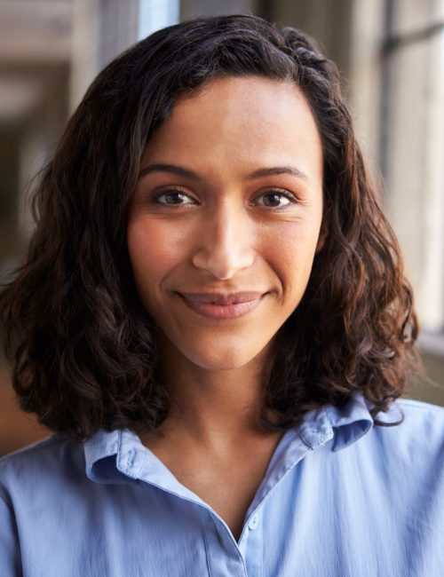 close-up-portrait-of-smiling-mixed-race-businesswo-2026-03-10-04-01-14-utc (2)